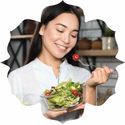 Woman enjoying healthy salad